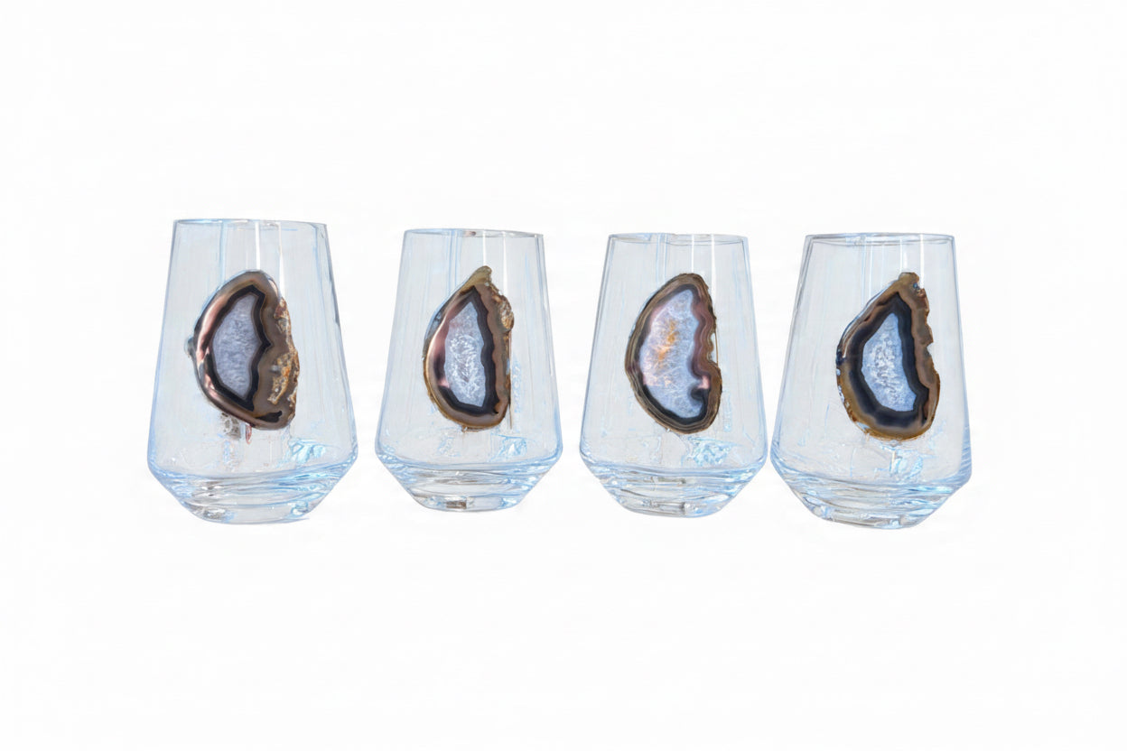 Crystal stemless wineglass affixed with natural geode.