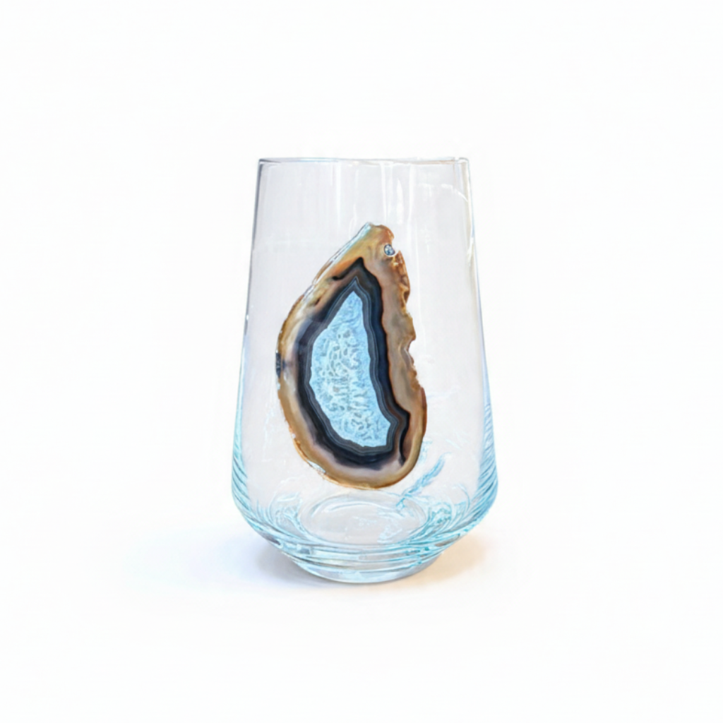 Crystal stemless wineglass affixed with natural geode.