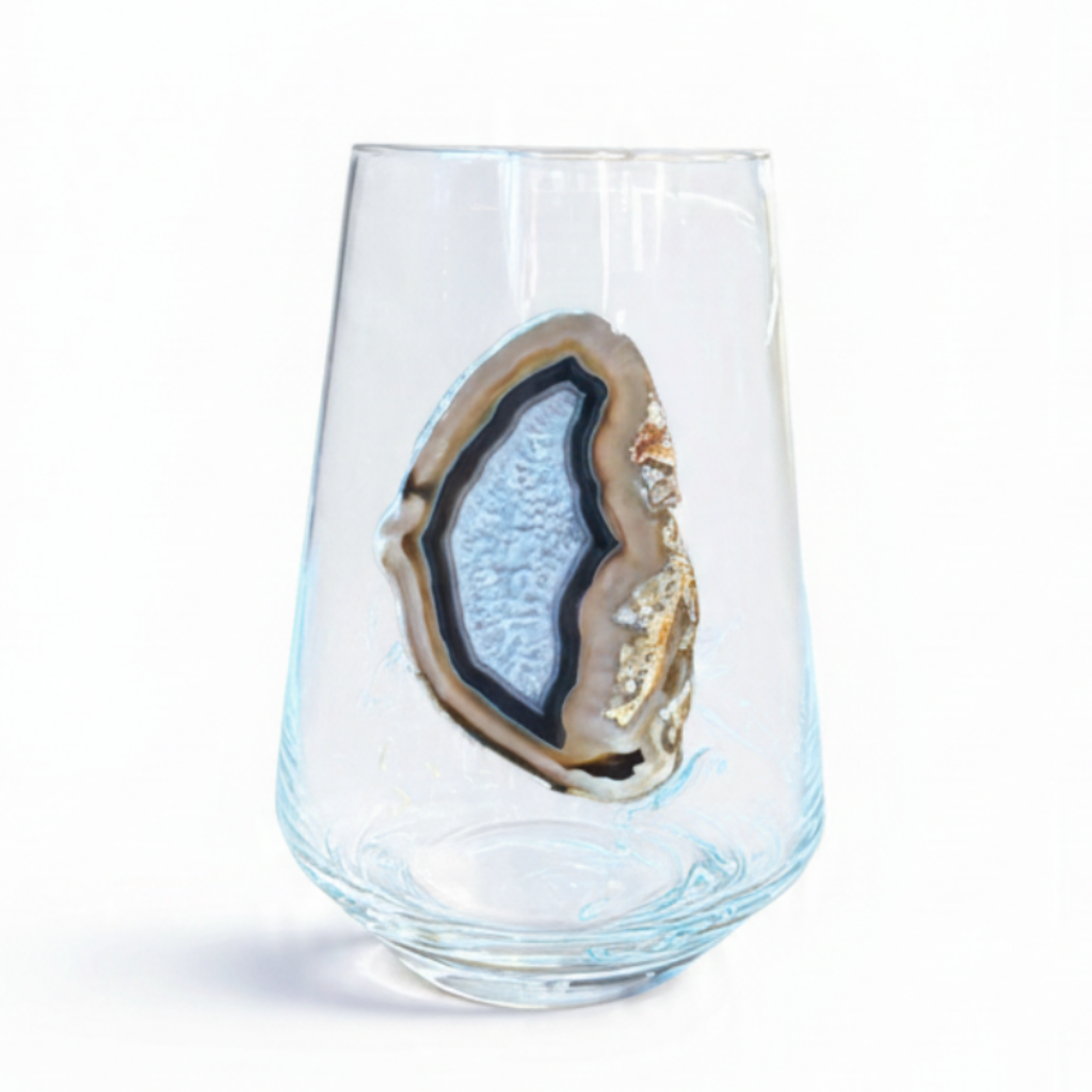 Crystal stemless wineglass affixed with natural geode.