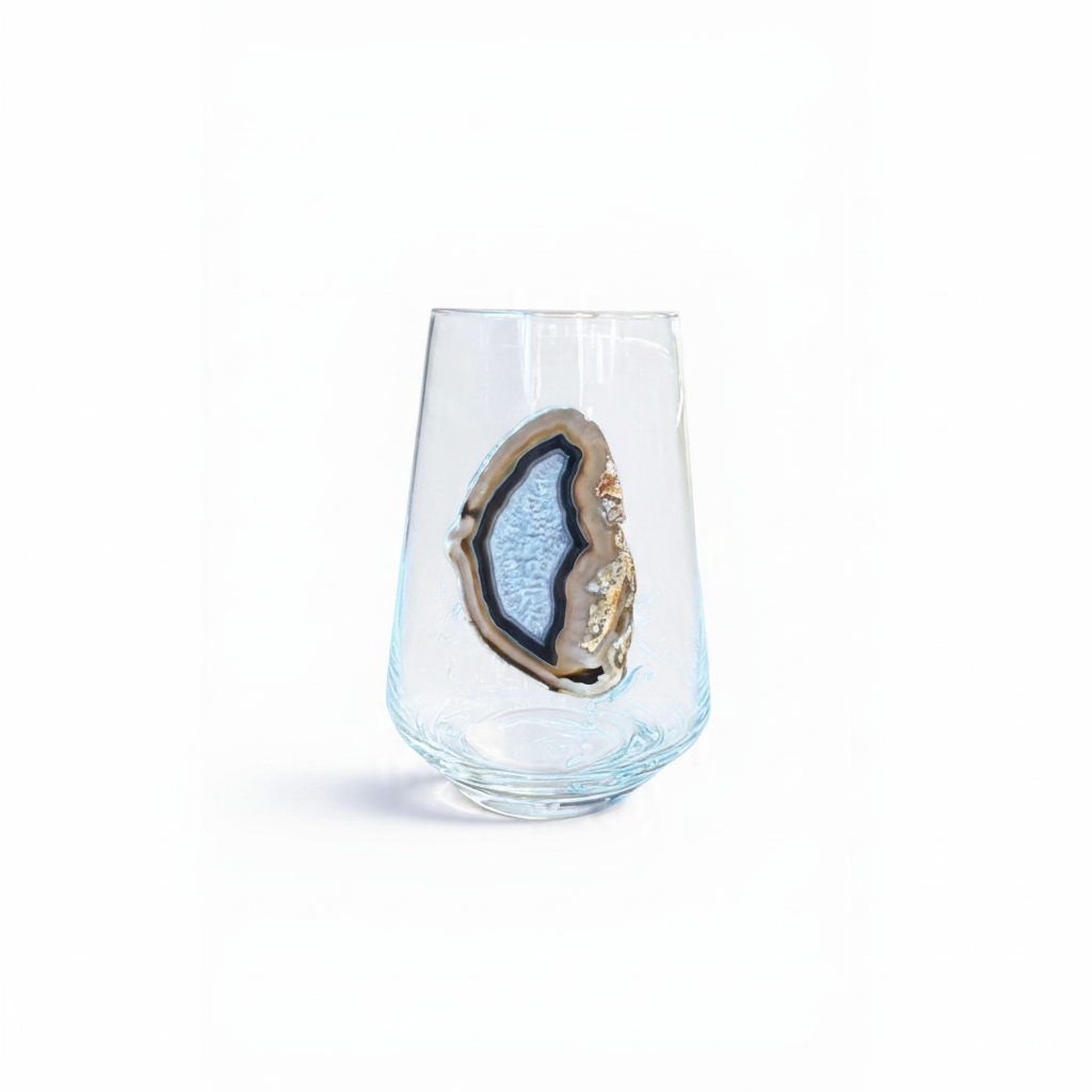 Crystal stemless wineglass affixed with natural geode.