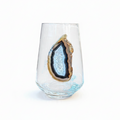 Crystal stemless wineglass affixed with natural geode.