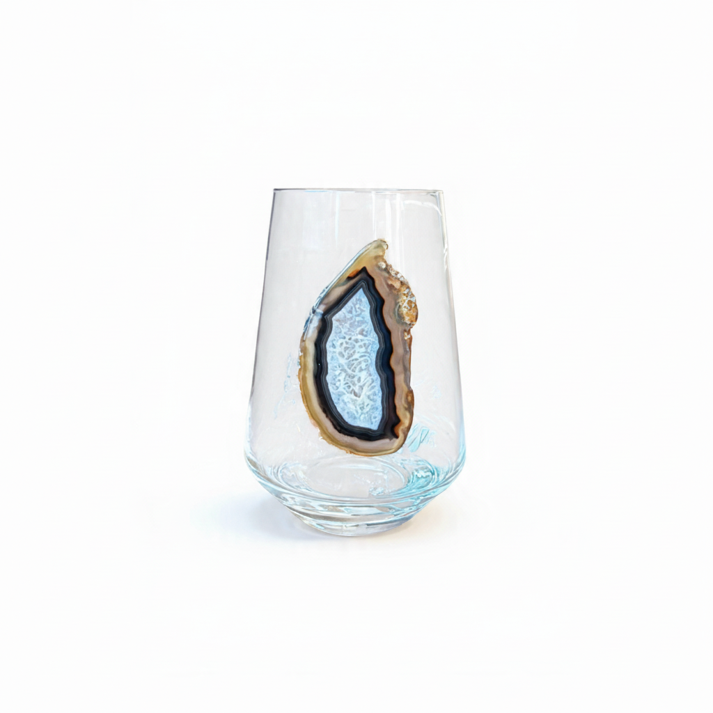 Crystal stemless wineglass affixed with natural geode.
